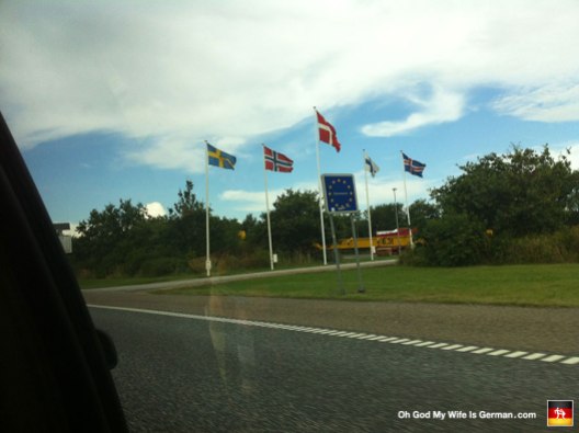 Aaaaand there's the border. No security. No checkpoint. Just some nice flags and a warm greeting.