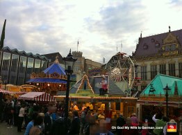 We just happened to show up on the last day of the Bremen Freimarkt. Odd mix of medieval buildings and fatty foods.